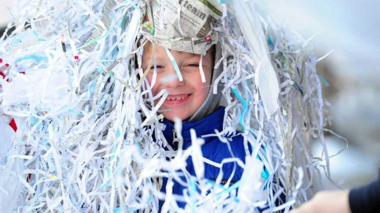 Thousands of fans line the streets in lower Manhattan during today's New York Giants Super Bowl parade in New York. (Feb. 7, 2012)