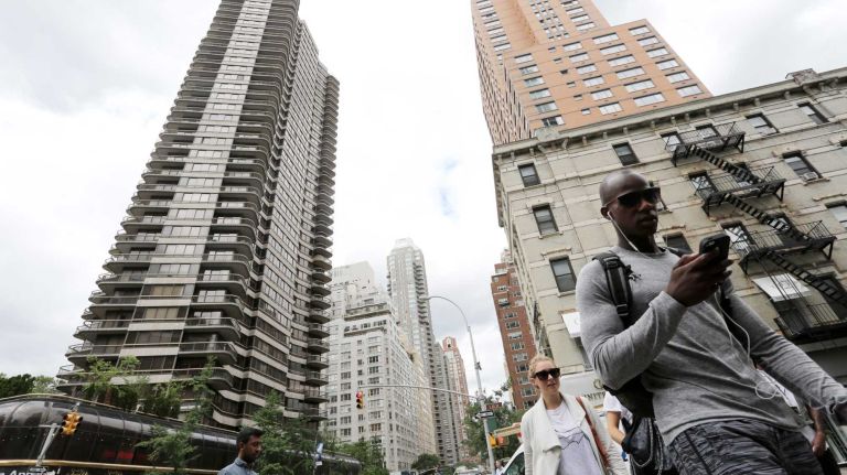 City Living: East 60s 24 Large apartment buildings on 3rd Ave. near 60th on the Upper East Side, Monday, June 29, 2015.