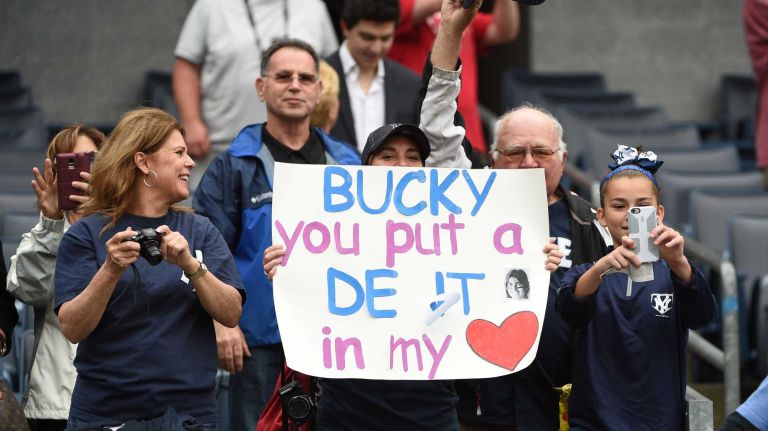 Fans hold a sign for former New York Yankees Bucky Dent during the 69th Old-Timers' Day at Yankee Stadium before a baseball game between the Yankees and the Detroit Tigers on Saturday, June 20, 2015.