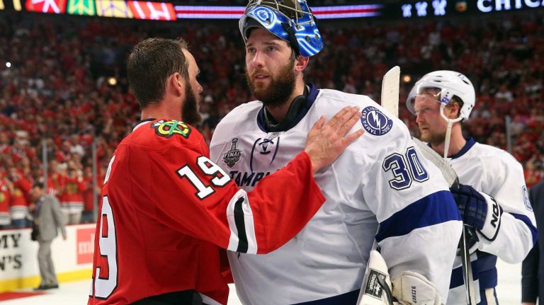 Stanley Cup Final: Blackhawks vs. Lightning 27 CHICAGO, IL - JUNE 15: Jonathan Toews #19 of the Chicago Blackhawks shakes hands with Ben Bishop #30 of the Tampa Bay Lightning after the Blackhawks won Game Six by a score of 2-0 to win the 2015 NHL Stanley Cup Final at the United Center on June 15, 2015 in Chicago, Illinois. (Photo by Bruce Bennett/Getty Images)