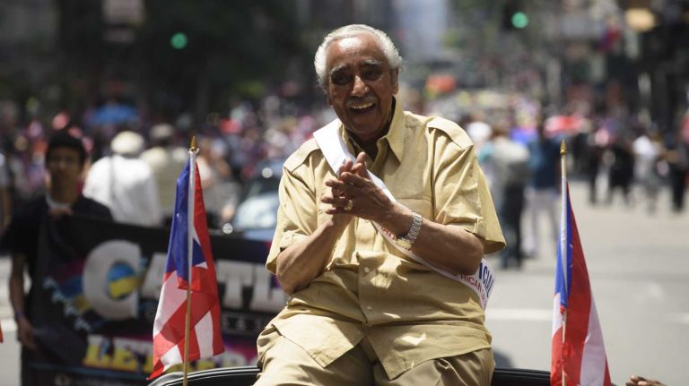 Congressman Charles Rangel is driven along 5th Avenue during the 58th annual Puerto Rican Day Parade in Manhattan on June 14, 2015. The annual parade celebrates Puerto Rican heritage and culture. It is one of the largest parades in New York City.