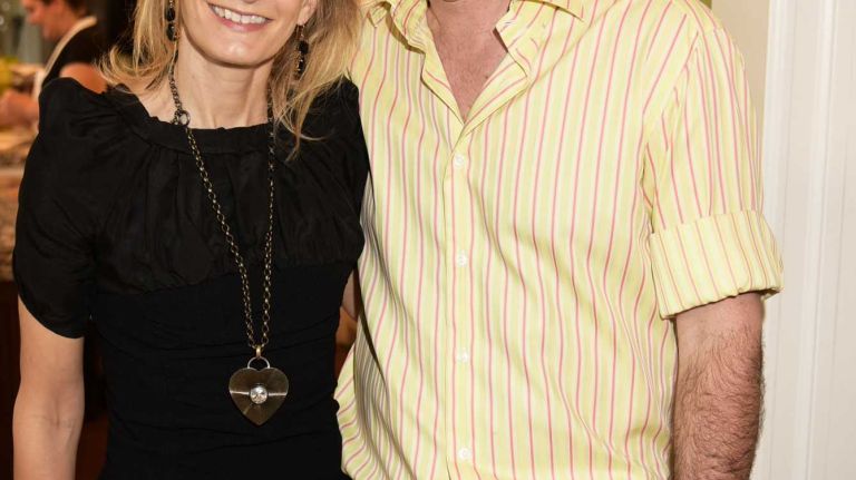 Author Wednesday Martin and her host Bruce Titelbaum take a moment during a book party on Saturday, June 6, 2015, for Martin's 