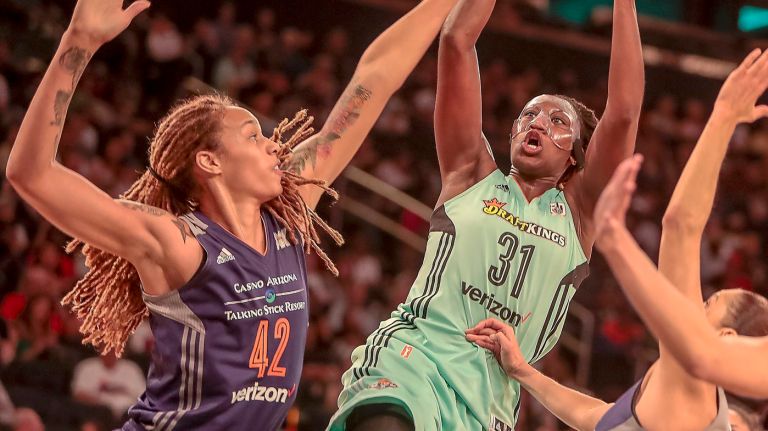Tina Charles, left, and Brittney Griner will square off Saturday night in the WNBA Playoffs.
