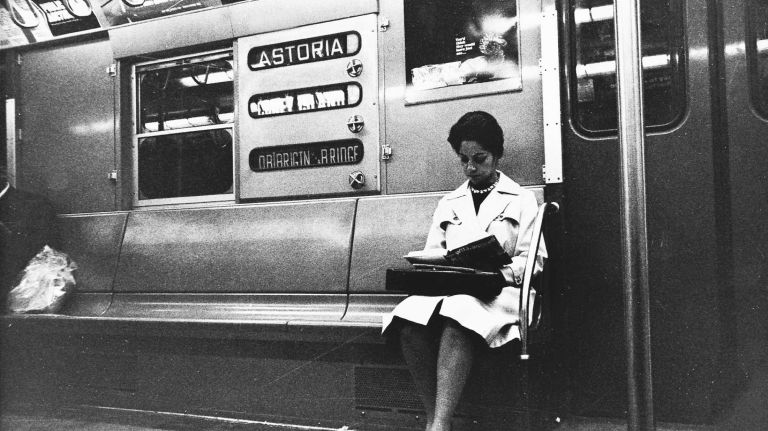 A lone passenger sits in a subway car on the Brighton Beach line in Brooklyn. (June 1, 1964)