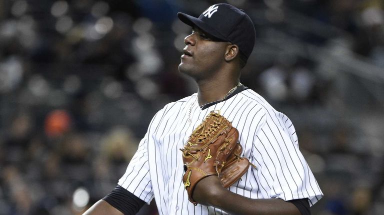 New York Yankees starting pitcher Michael Pineda walks to the dugout in a baseball game against the New York Mets at Yankee Stadium on Friday, April 24, 2015.