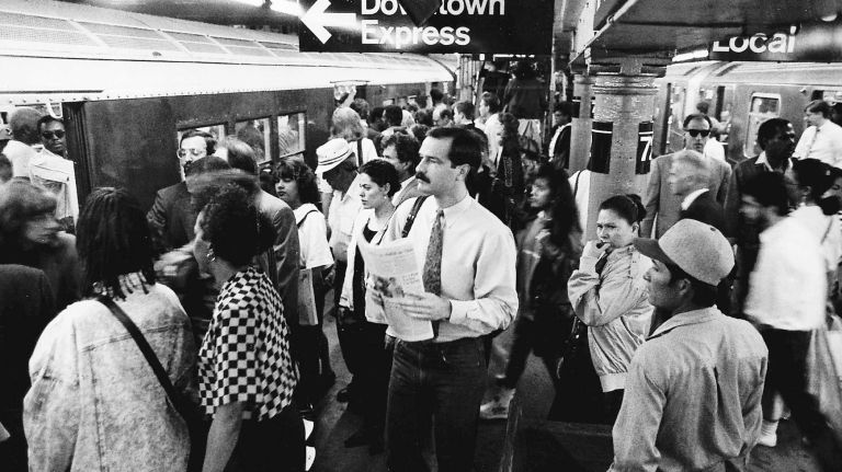 A crowded subway platform on the downtown side of the 72nd Street station during the morning rush hour. (May 22, 1992)