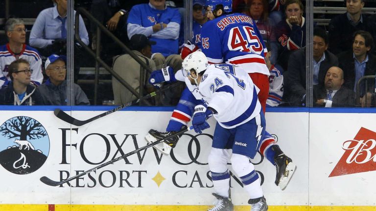 Ryan Callahan #24 of the Tampa Bay Lightning checks James Sheppard #45 of the New York Rangers in the first period during Game 2 of the Eastern Conference finals at Madison Square Garden on Monday, May 18, 2015.