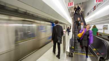 Commuters wait for a Hoboken-bound PATH train at the World Trade Center Transportation Hub in Manhattan on May 6, 2015.
