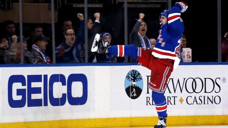 NEW YORK, NY - JANUARY 20: Chris Kreider #20 of the New York Rangers celebrates after scoring a goal in the third period against Craig Anderson #41 of the Ottawa Senators during their game at Madison Square Garden on January 20, 2015 in New York City. (Photo by Bruce Bennett/Getty Images)