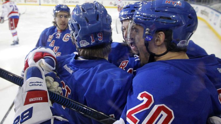 Rangers vs. Capitals: Game 2 of round 2 of Stanley Cup playoffs 39 Chris Kreider #20 of the New York Rangers celebrates his first-period goal against the Washington Capitals with teammate Jesper Fast #19 during Game 2 of the Eastern Conference semifinals at Madison Square Garden on Saturday, May 2, 2015.