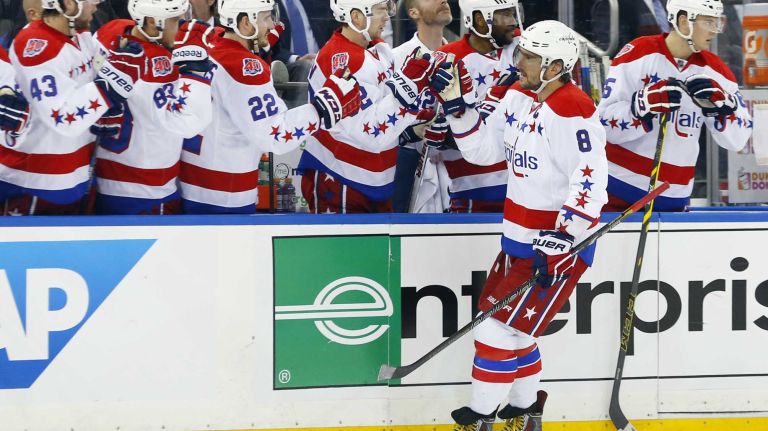 Alex Ovechkin #8 of the Washington Capitals celebrates his first-period goal against the New York Rangers with his teammates during Game 1 of the Eastern Conference semifinals at Madison Square Garden on Thursday, April 30, 2015.