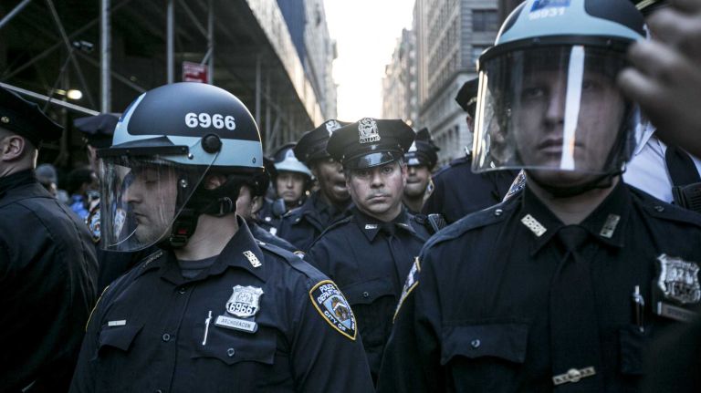 NYC protests for Baltimore: photos 10 Police officers stand as protesters rally in Union Square on Wednesday, April 29, 2015.