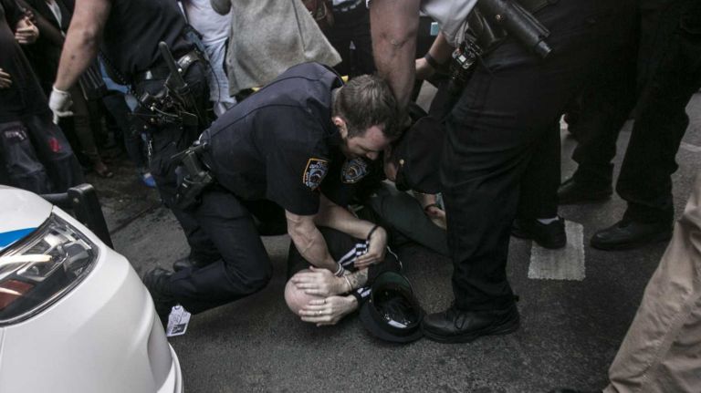 NYC protests for Baltimore: photos 15 A protester is arrested during a rally in Union Square on Wednesday, April 29, 2015, following the death of Freddie Gray in Baltimore.