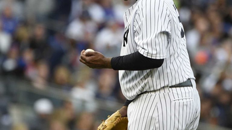 New York Yankees starting pitcher CC Sabathia reacts during the sixth inning against the New York Mets in a baseball game at Yankee Stadium on Saturday, April 25, 2015.