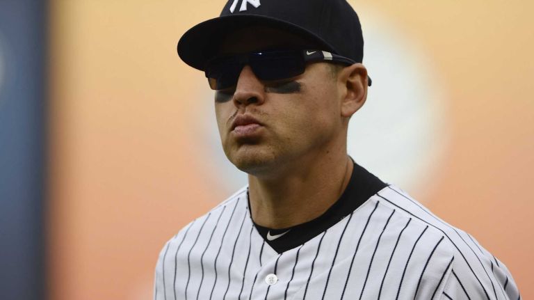 New York Yankees centerfielder Jacoby Ellsbury runs to the dugout during the sixth inning of a baseball game against the New York Mets at Yankee Stadium on Saturday, April 25, 2015.