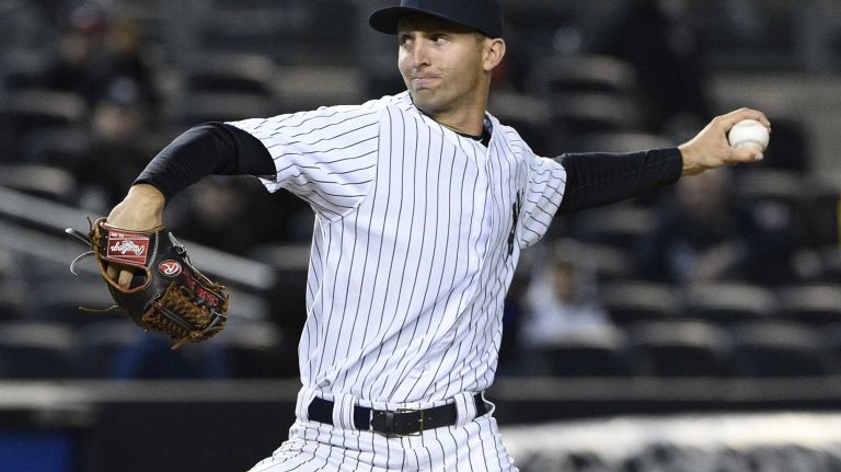 New York Yankees relief pitcher Chasen Shreve delivers against the New York Mets in a baseball game at Yankee Stadium on Friday, April 24, 2015.