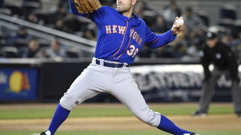 New York Mets relief pitcher Sean Gilmartin delivers against the New York Yankees in a baseball game at Yankee Stadium on Friday, April 24, 2015.