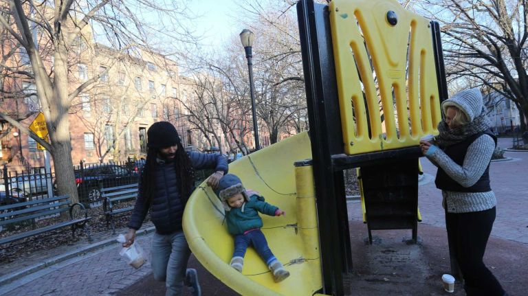 John Rankin, with daughter, Claire, 1.5 years, and Houma Hynes in Cobble Hill Park in Cobble Hill, Brooklyn, Monday, Jan., 5, 1015.