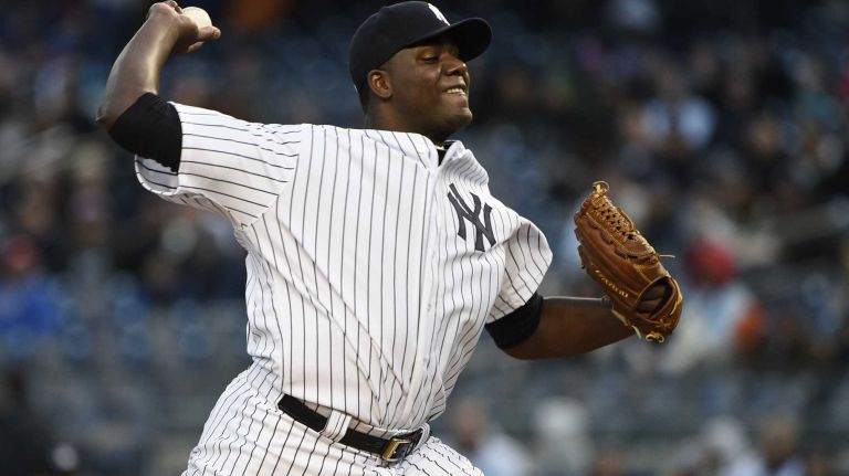 New York Yankees starting pitcher Michael Pineda delivers against the New York Mets in the first inning of a baseball game at Yankee Stadium on Friday, April 24, 2015.
