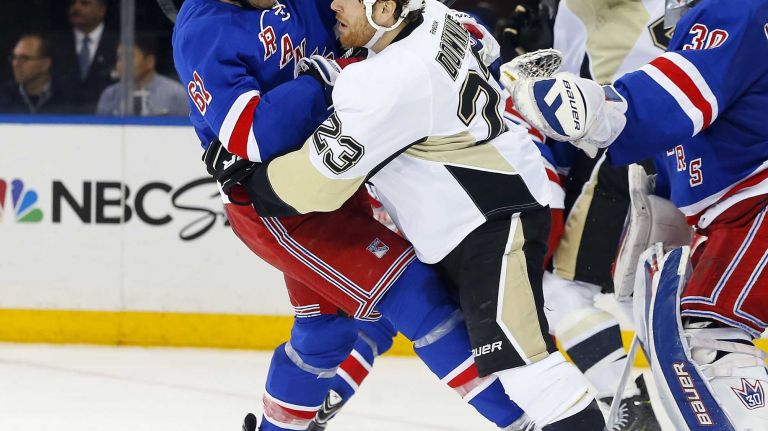 Steve Downie of the Pittsburgh Penguins defends against Rick Nash of the New York Rangers in the third period during Game 5 of the Eastern Conference Quarterfinals at Madison Square Garden on Friday, April 24, 2015.