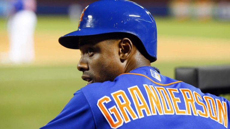 Curtis Granderson #3 of the Mets looks on in the fourth inning against the Texas Rangers at Citi Field on Friday, July 4, 2014 in Queens.