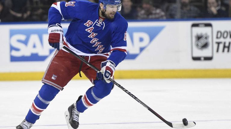 Rick Nash 38 New York Rangers left wing Rick Nash skates with the puck against the Columbus Blue Jackets in the third period of an NHL hockey game at Madison Square Garden on Sunday, February 22, 2015. The Rangers won 4-3 in a shootout.