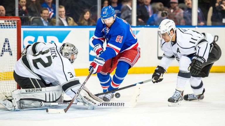Rick Nash 45 Los Angeles Kings goalie Jonathan Quick (32) blocks a shot from New York Rangers left wing Rick Nash (61) while under pressure from Los Angeles Kings center Anze Kopitar (11) during a game at Madison Square Garden on Tuesday, March 24, 2015.