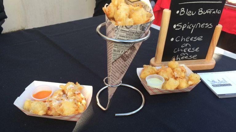 Cheese curds are a squeaky, delicious treat. The cheese pieces are the result of the process of separating whey from milk. Popular in Wisconsin and Minnesota, they are bite-sized and fun to eat. Curd's the Word is the project of a midwestern woman in NYC who missed the taste of back home. She fries the NY cheese in beer batter and serves them in multiple flavors, from buffalo to spicy to garlic pesto. Perfect Smorgasburg food. 