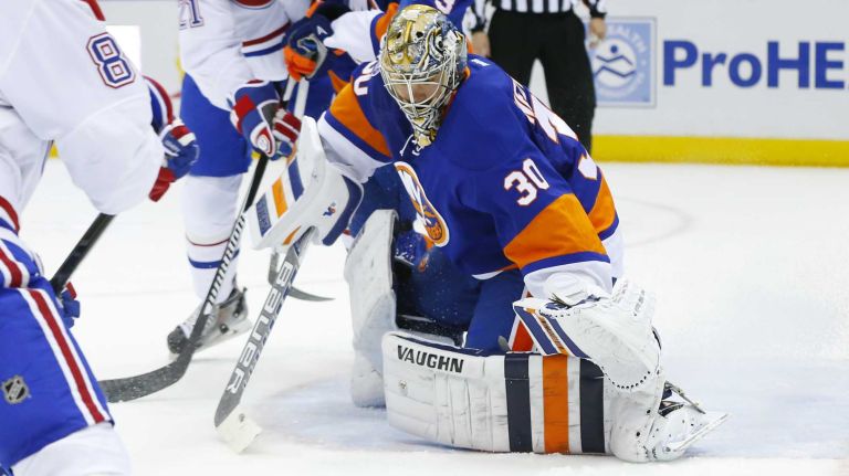 Michal Neuvirth of the New York Islanders makes a save in the second period against the Montreal Canadiens at Nassau Coliseum on Saturday, March 14, 2015 in Uniondale.