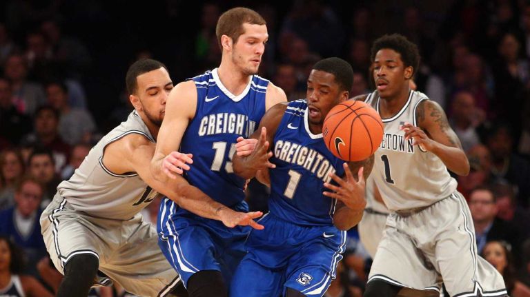 Creighton Bluejays guard Austin Chatman loses control of the ball in front of Creighton Bluejays guard Rick Kreklow, Georgetown Hoyas forward Paul White and Georgetown Hoyas guard Tre Campbell during the first half of a Big East Tournament game at Madison Square Garden on Thursday, March 12, 2015.