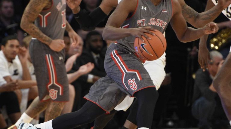 Big East Tournament quarterfinal: St. John's vs. Providence 19 St. John's Red Storm guard Phil Greene IV drives the ball against the Providence Friars in a Big East quarterfinal men's basketball game at Madison Square Garden on Thursday, March 12, 2015.