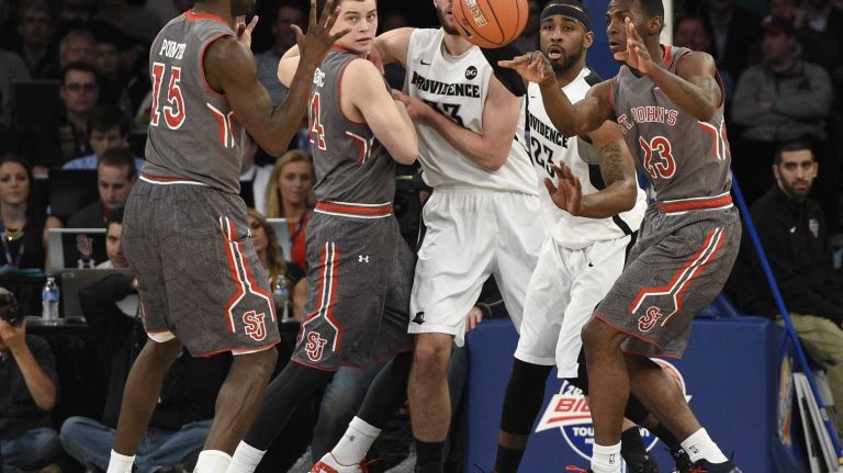 Big East Tournament quarterfinal: St. John's vs. Providence 24 St. John's Red Storm guard Rysheed Jordan passes the ball out to guard Sir'Dominic Pointer against the Providence Friarsin a Big East quarterfinal men's basketball game at Madison Square Garden on Thursday, March 12, 2015.