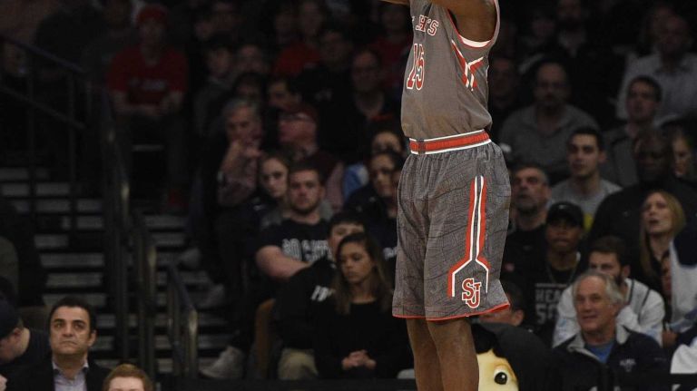 Big East Tournament quarterfinal: St. John's vs. Providence 26 St. John's Red Storm guard Sir'Dominic Pointer misses a jump shot against the Providence Friars in a Big East quarterfinal men's basketball game at Madison Square Garden on Thursday, March 12, 2015.