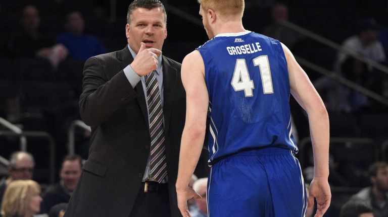 Creighton Bluejays head coach Greg McDermott directs Creighton Bluejays center Geoffrey Groselle against the DePaul Blue Demons in the first round of the Big East basketball tournament at Madison Square Garden on Wednesday, March 11, 2015. 