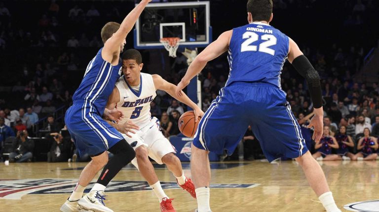 DePaul Blue Demons guard Billy Garrett Jr. drives against Creighton Bluejays guard Rick Kreklow in the first round of the Big East basketball tournament at Madison Square Garden on Wednesday, March 11, 2015.