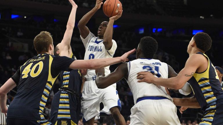 Big East Tournament first round: Marquette vs. Seton Hall 34 Seton Hall Pirates guard Khadeen Carrington puts up a shot against the Marquette Golden Eagles in the first round of the Big East basketball tournament at Madison Square Garden on Wednesday, March 11, 2015.