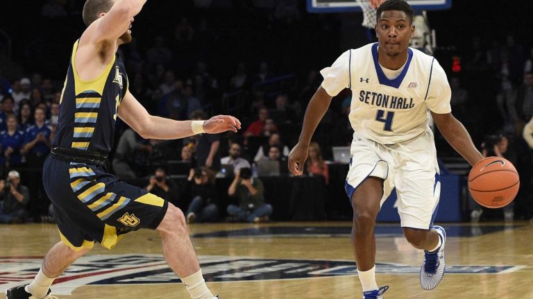 Big East Tournament first round: Marquette vs. Seton Hall 49 Seton Hall Pirates guard Sterling Gibbs dribbles the ball against Marquette Golden Eagles guard Matt Carlino in the first round of the Big East basketball tournament at Madison Square Garden on Wednesday, March 11, 2015.