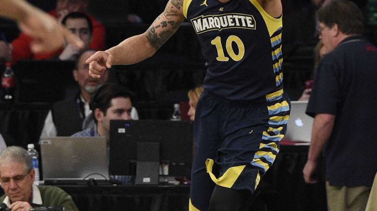 Big East Tournament first round: Marquette vs. Seton Hall 52 Marquette Golden Eagles forward Juan Anderson reacts after sinking a layup against the Seton Hall Pirates in the first round of the Big East basketball tournament at Madison Square Garden on Wednesday, March 11, 2015.