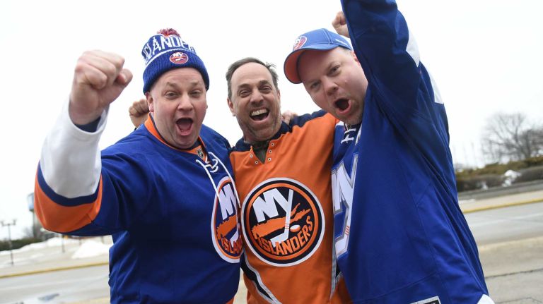Fans at Islanders vs. Rangers 36 Darren Turton of Westbury, Frank Rizzo of Carle Place and John McDonough of Stewart Manor tailgate in the parking lot of Nassau Coliseum before the last Islanders-Rangers regular-season game at the Coliseum on March 10, 2015.