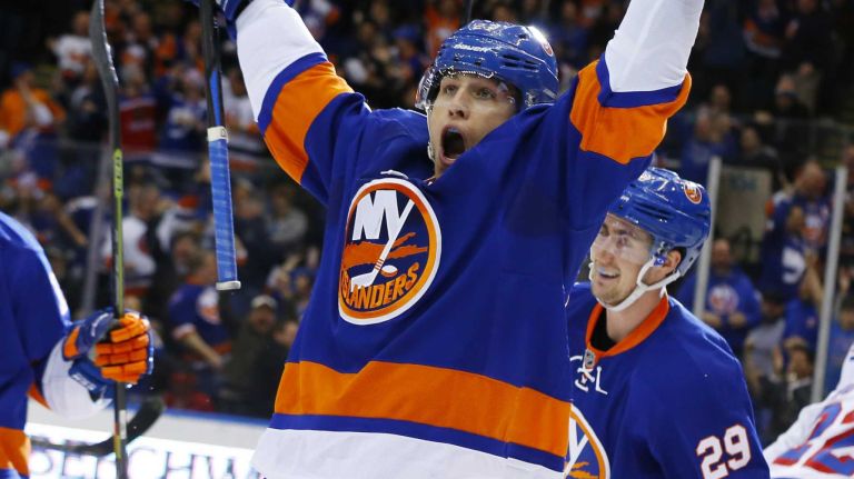 Anders Lee of the New York Islanders celebrates his first-period goal against the New York Rangers at Nassau Coliseum on Tuesday, March 10, 2015.