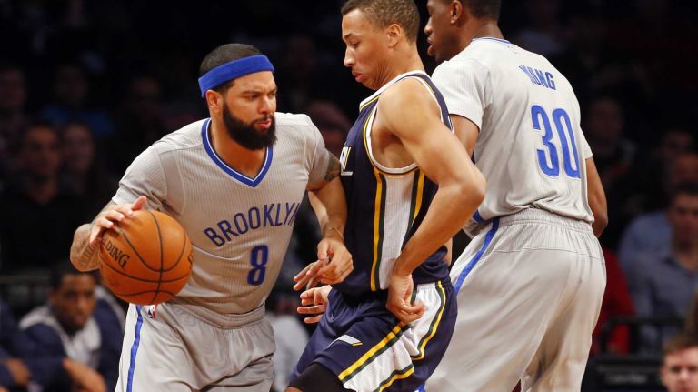 Brooklyn Nets vs. Utah Jazz 46 Deron Williams #8 of the Brooklyn Nets drives against Dante Exum #11 of the Utah Jazz in the first half at Barclays Center on Sunday, Mar. 8, 2015 in Brooklyn, New York.