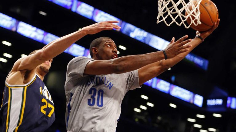 Brooklyn Nets vs. Utah Jazz 50 Thaddeus Young #30 of the Brooklyn Nets lays up a basket against the Utah Jazz at Barclays Center on Sunday, Mar. 8, 2015 in Brooklyn, New York.