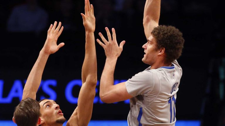 Brooklyn Nets vs. Utah Jazz 75 Brook Lopez of the Brooklyn Nets puts up a shot against Rudy Gobert of the Utah Jazz at Barclays Center on Sunday, March 8, 2015 in Brooklyn.