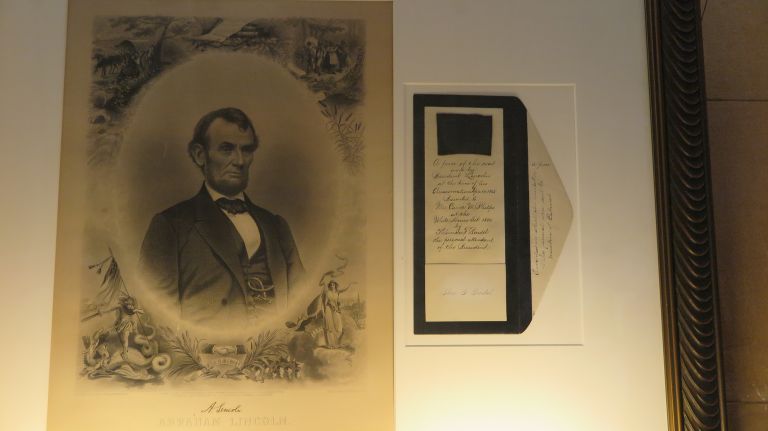 A square-cut piece of Abraham Lincoln's coat jacket that he wore the night of his assassination is on display in the church's long gallery. The staff see it as a grimly interesting artifact but also distasteful on the part of whomever came up with the idea to cut up the poor man's coat and sell it.