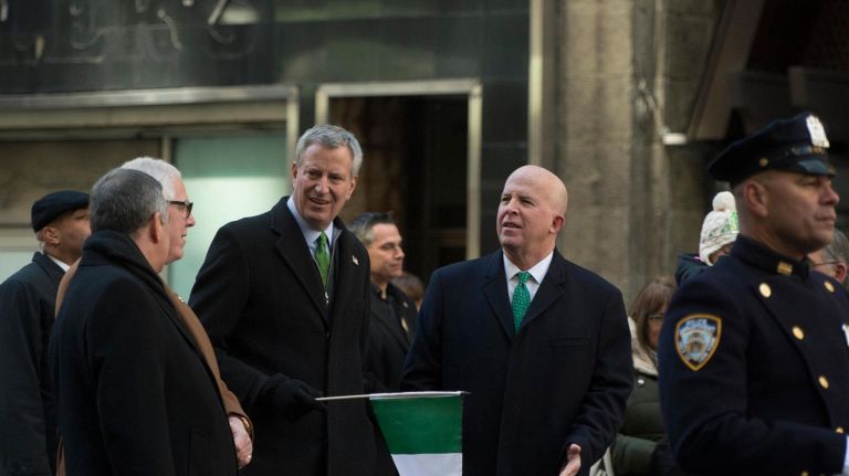 Mayor Bill de Blasio and Police Commissioner James O'Neill marched in the St. Patrick's Day Parade on Saturday.