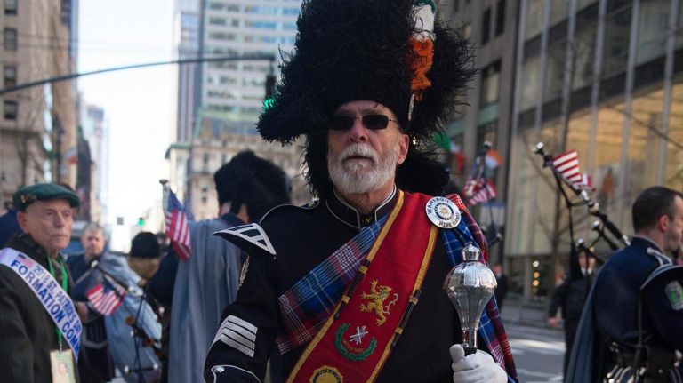 John Levey, a member of the Wantagh American Legion Pipe Band, gets ready to march in the St. Patrick's Day Parade in Manhattan on Saturday.