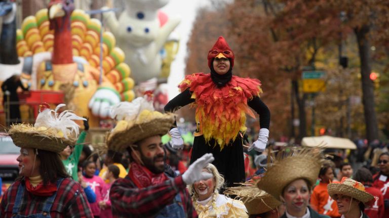 The Tom Turkey and Pillsbury Doughboy floats travel along Central Park West on Thursday, Nov. 24, 2016, at the start of the 90th Macy's Thanksgiving Day Parade in Manhattan.