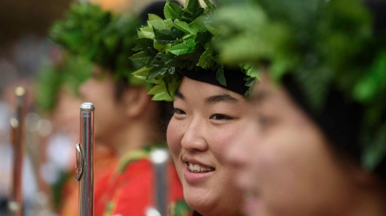 Na Koa Ali'l, the Hawaii all-state marching band, performs on Thursday, Nov. 24, 2016, along Central Park West at the start of the the 90th Macy's Thanksgiving Day Parade in Manhattan.