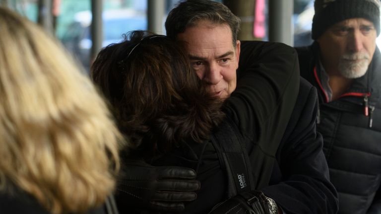 Patrick Breslin, center, the son of Pulitzer Prize-winning columnist Jimmy Breslin, arrives for his father's funeral Mass at the Church of the Blessed Sacrament in Manhattan on Wednesday, March 22, 2017. 