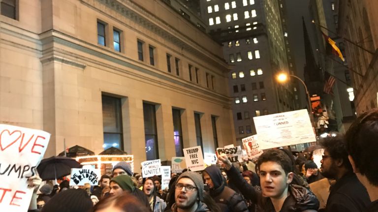 Anti-Trump protesters march from Foley Square through lower Manhattan chanting, 